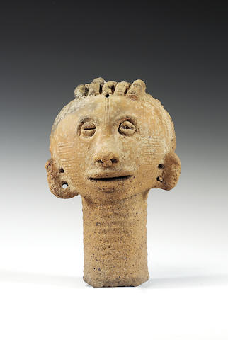 An Ashanti terracotta funerary head 20cm.