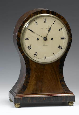An early 19th century zebra wood banded mahogany balloon clock Repainted dial signed Thomas Harris, London