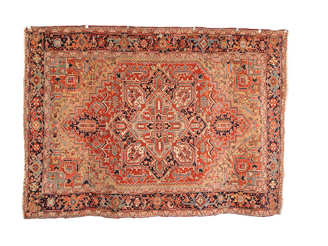 A Heriz carpet North West Persia, 229cm x 325cm