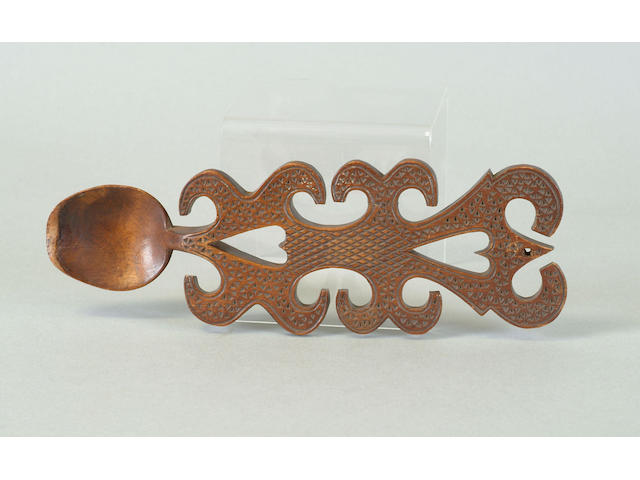 A Welsh fruitwood love spoon,