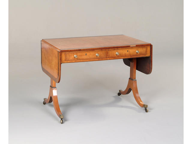 A George III satinwood and rosewood crossbanded sofa table
