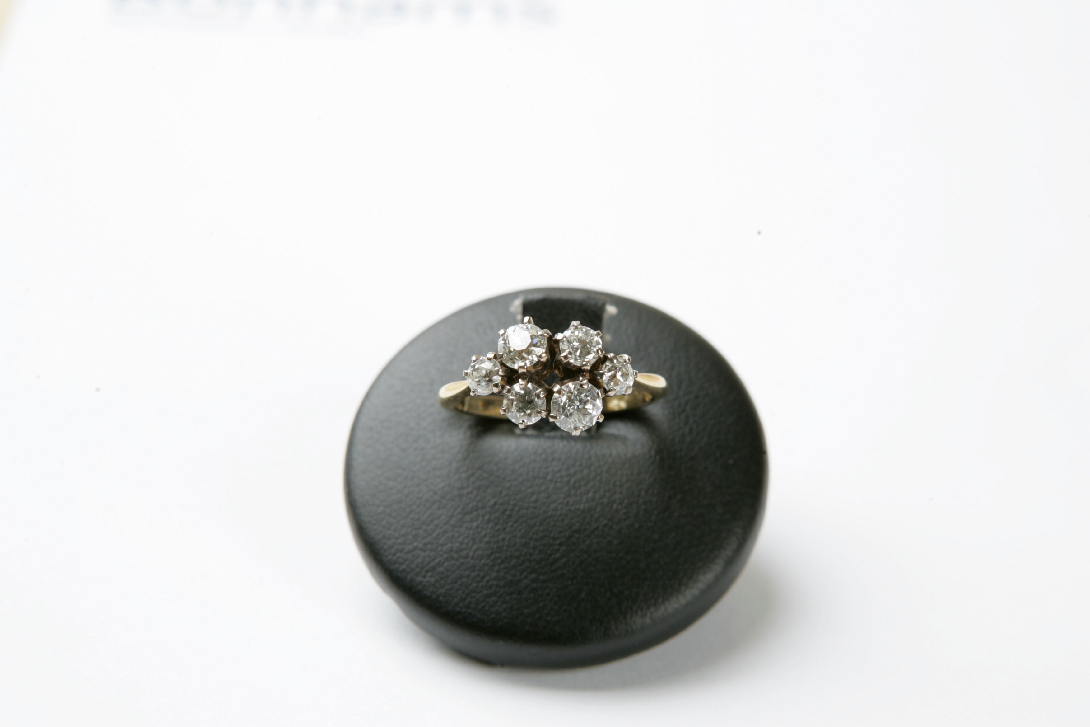 A diamond six-stone ring