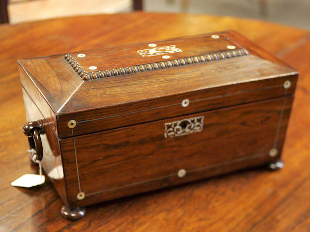 A Regency Rosewood and mother-of-pearl inlaid Tea Caddy,