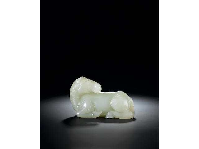 A fine white jade model of a recumbent horse 18th Century