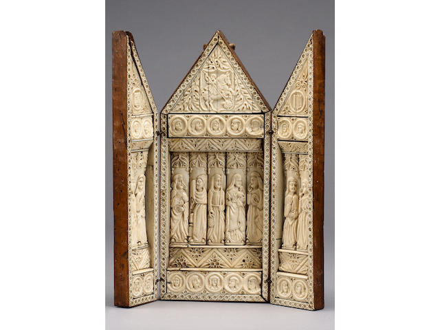 An Italian carved bone inlaid wooden triptych