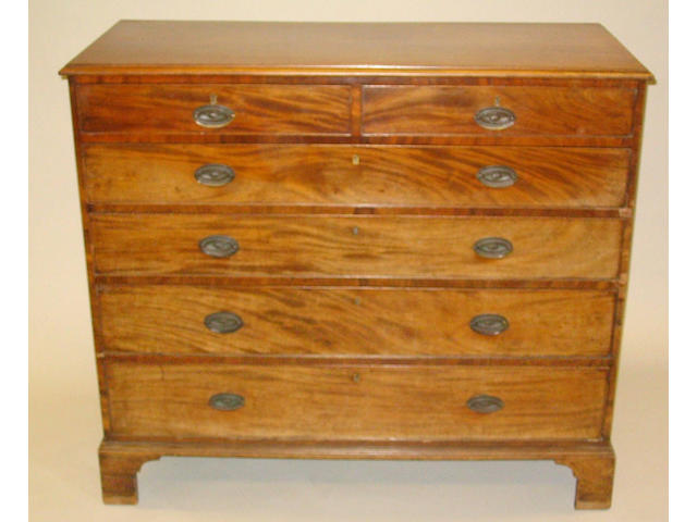 A late George III provincial mahogany chest,