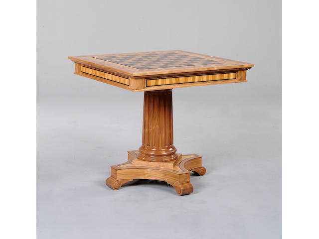 A satinwood, walnut and rosewood games table by David Linley