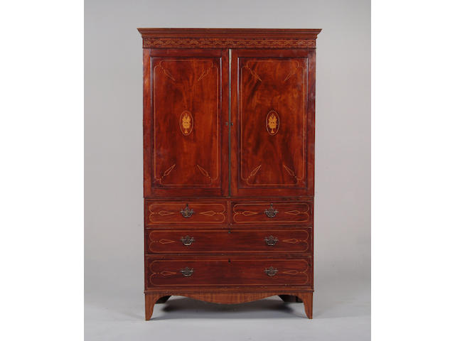 A George III style mahogany and satinwood inlaid linen press