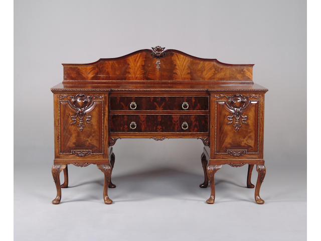 A pair of early 20th century mahogany sideboards