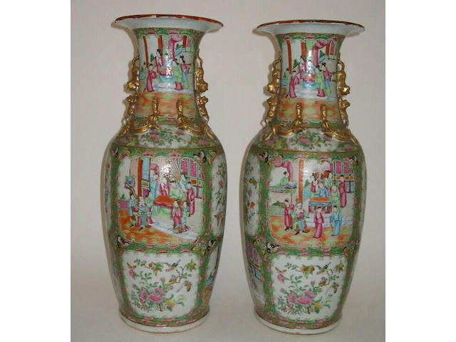 A pair of Canton export famille rose vases