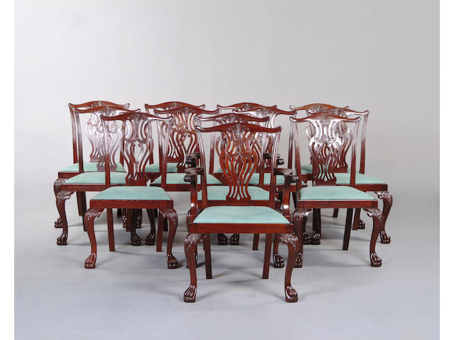 A set of twelve Chippendale style mahogany dining chairs