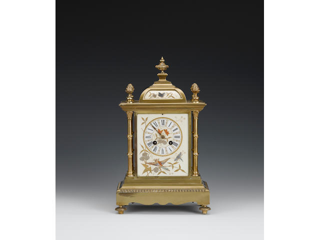 A late 19th Century French lacquered brass and bead-set mantel clock,