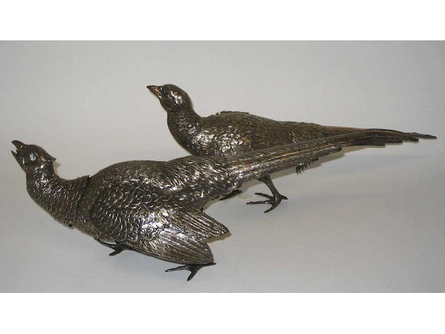 A pair of dining table pheasant ornaments With import marks for 1927,