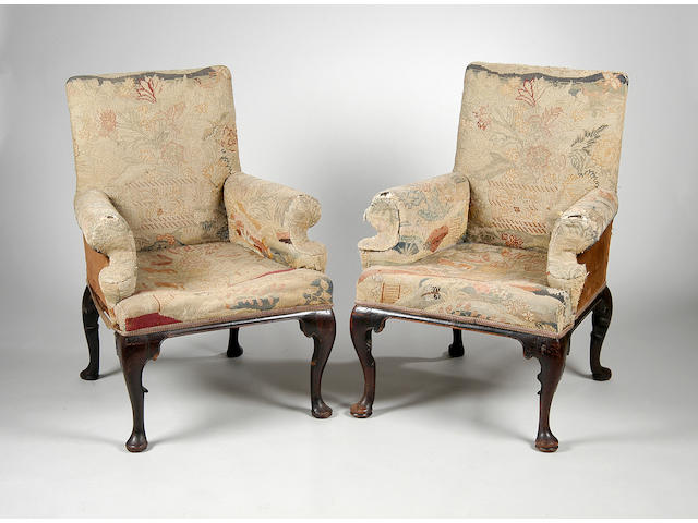 A near pair of mahogany armchairs,