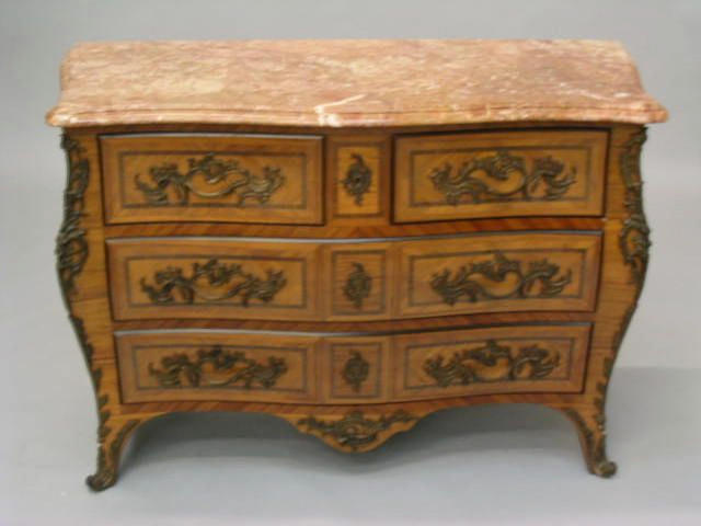 A Louis XV style walnut, rosewood crossbanded and gilt metal mounted bomb&#233; commode,