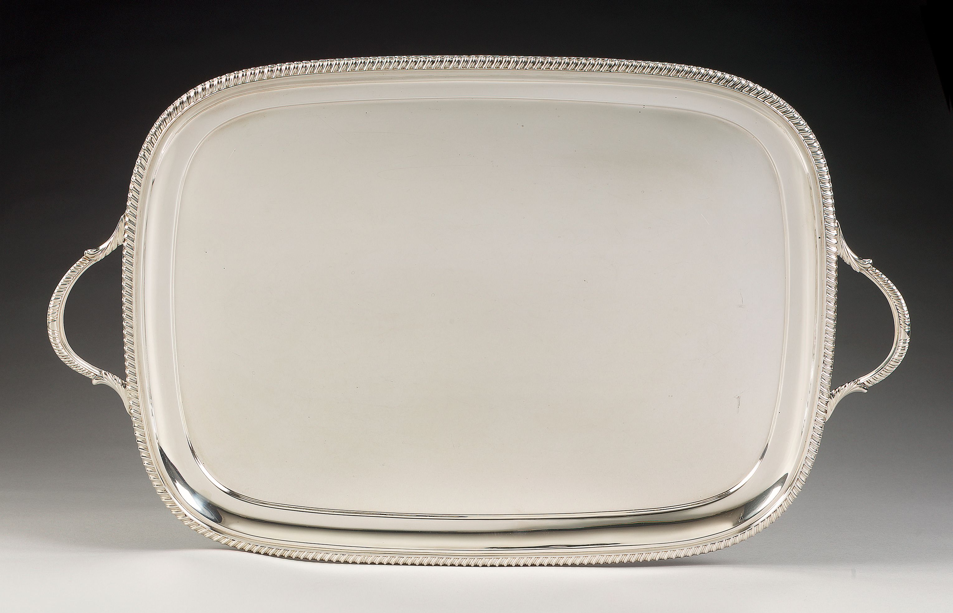 A silver two-handled rectangular tray, Sheffield 1913,
