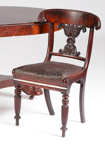 A set of four early 19th Century mahogany dining chairs