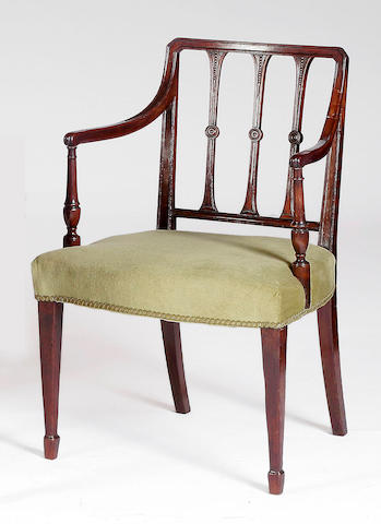A set of seven 19th Century Sheraton-style mahogany dining chairs,