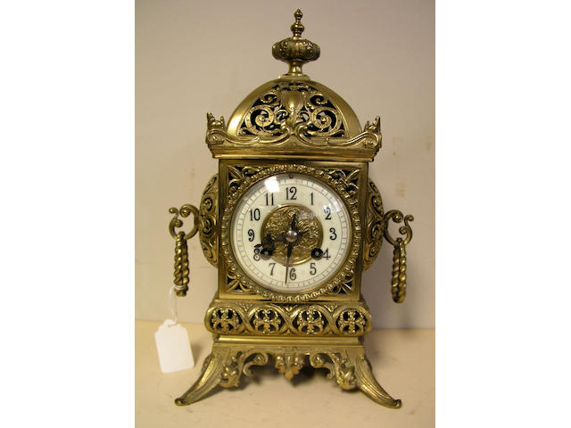 A late 19th Century French brass mantle clock
