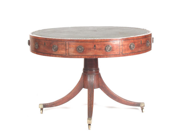 A Regency mahogany drum library table