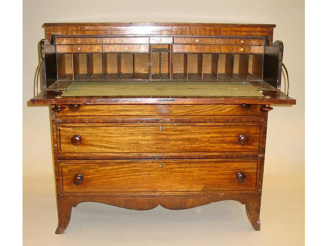 A late George III mahogany, line and dot inlaid secretaire chest,