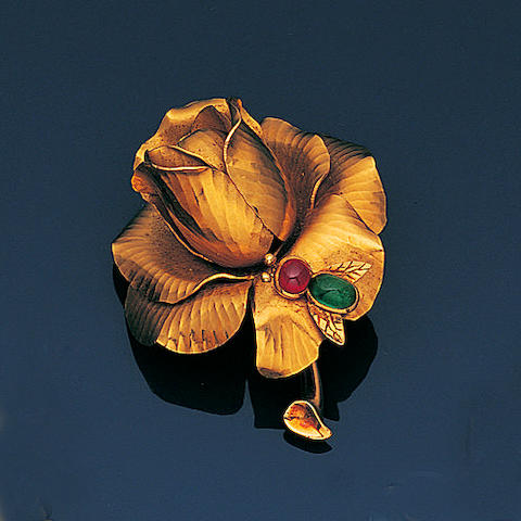 Bonhams : A gold and gem-set flower brooch, by Cartier,