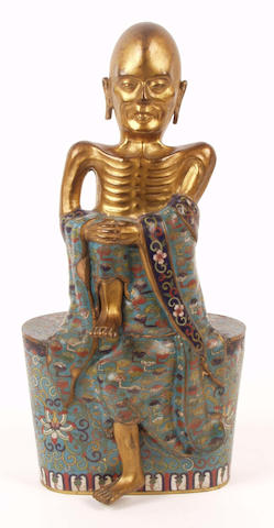An early 20th Century cloisonne figure of an emaciated lohan