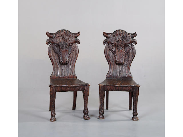 A pair of late 19th century hall chairs