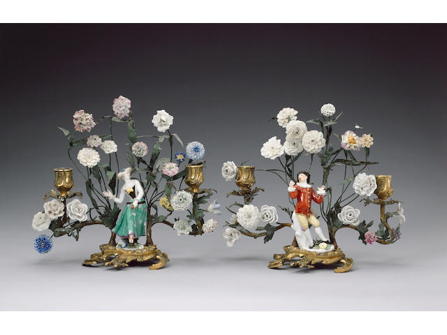 A good pair of Meissen figures of Columbine and Scaramouche mounted in ormolu with French porcelain flowers circa 1745
