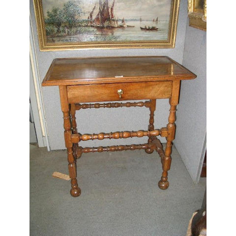 A French walnut side table,