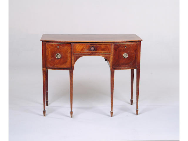 A George III style mahogany bowfront sideboard