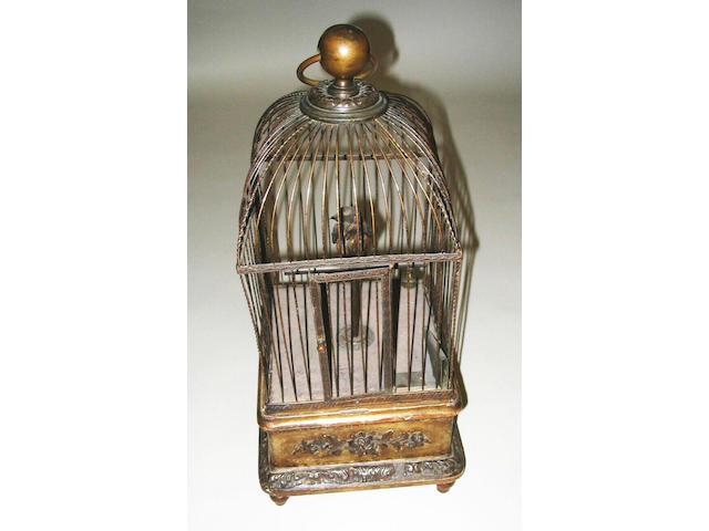 A singing bird-in-a-cage