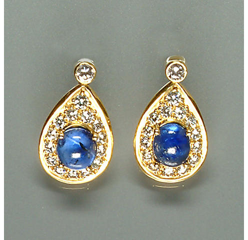 50303300004 A pair of diamond and cabochon sapphire drop earrings