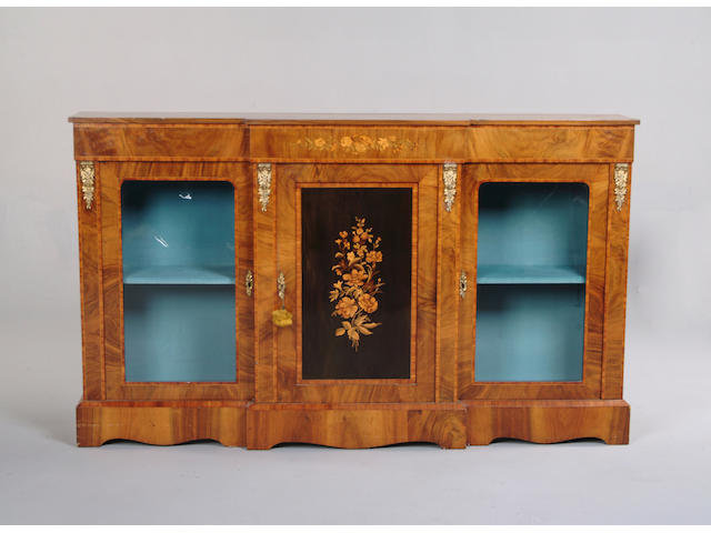 A Victorian walnut, tulipwood and marquetry breakfront credenza