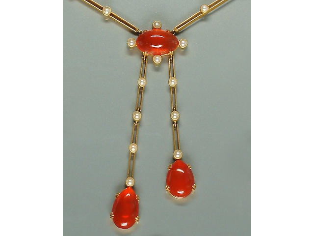 An early 20th century fire opal and seed pearl n&#233;glig&#233;e pendant/necklace,