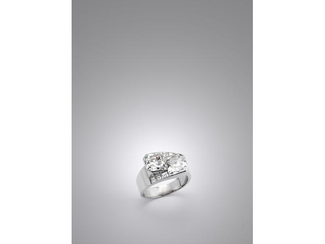 A two-stone emerald-cut diamond ring