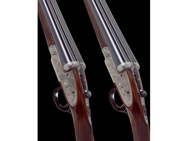 A fine pair of 12-bore single-trigger sidelock ejector guns by W. Evans, no. 13595/6 In their brass-mounted leather case