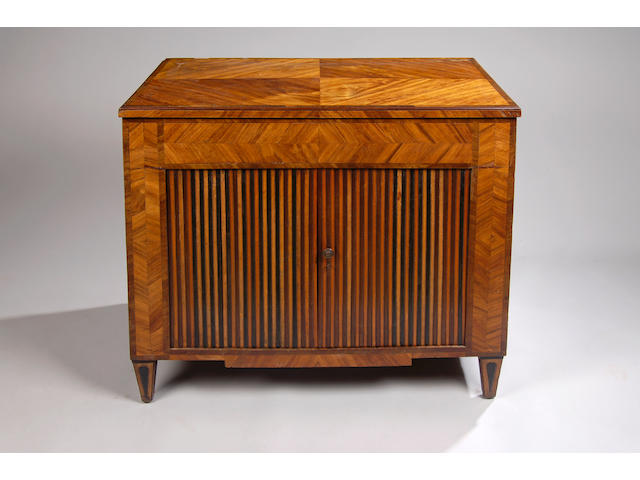 An early 19th Century French kingwood and tulipwood banded peudreuse,
