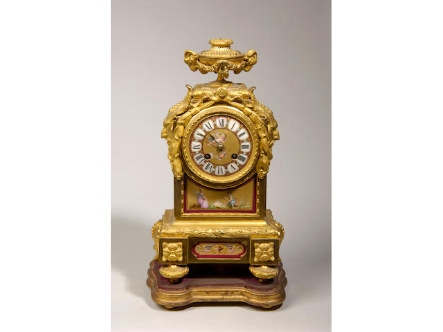 A French gilt metal mounted and porcelain panel mantel clock,