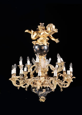 An impressive late 19th / early 20th century gilt and patinated bronze eighteen light chandelier