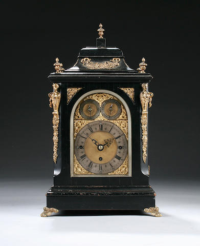 A small late 19th Century ebonised chiming bracket clock,