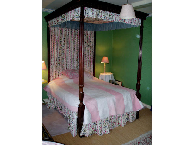 A 19th Century carved mahogany four poster bed,