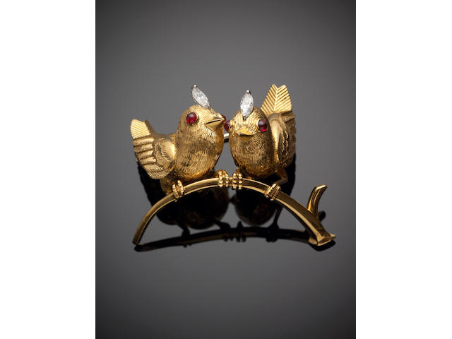 A gold and diamond double bird brooch, by Cartier,
