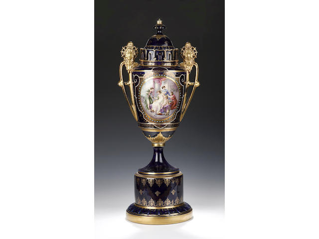 A large Vienna style two handled urn and cover, late 19th century,