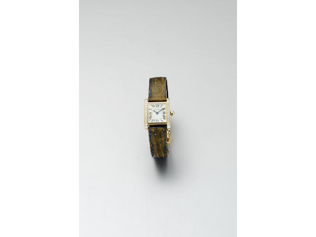 Cartier. A lady's 18ct gold and diamond set quartz wristwatchTank Francaise, Ref.2385, recent