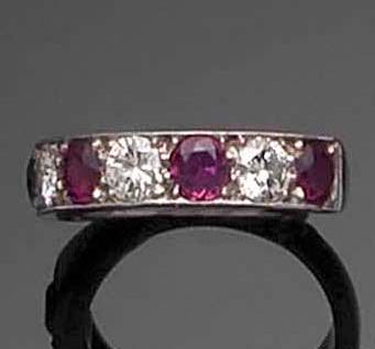 A ruby and diamond half-hoop eternity ring