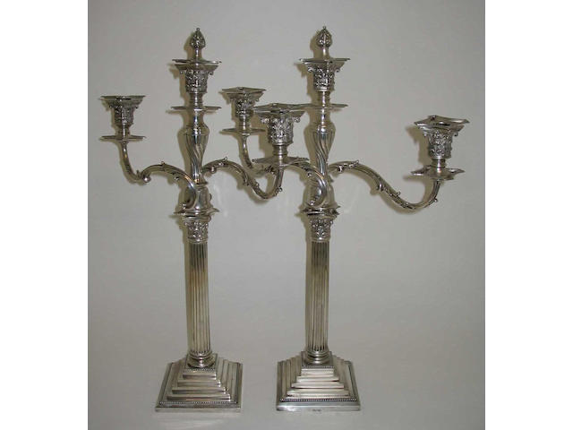 A pair of Victorian Corinthian column twin branch candelabra By Martin and Hall, 1887,