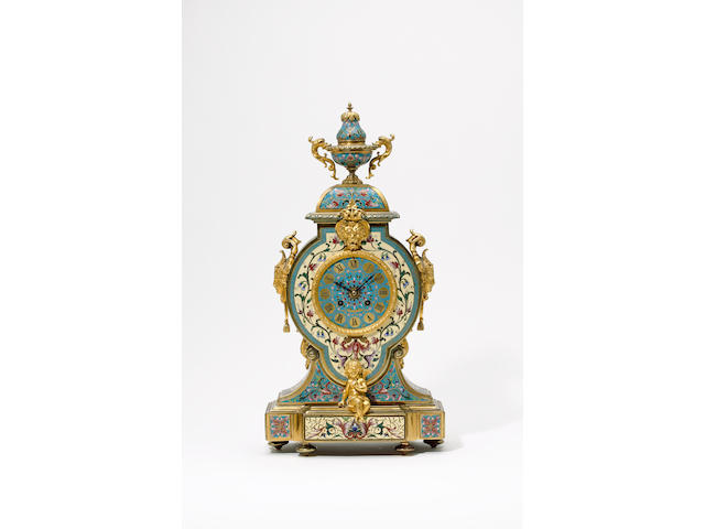 A good second half of the 19th century champleve enamel decorated mantel clock The movement signed CHles Mt, 14458