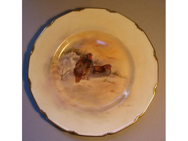 A set of five Royal Doulton dessert plates