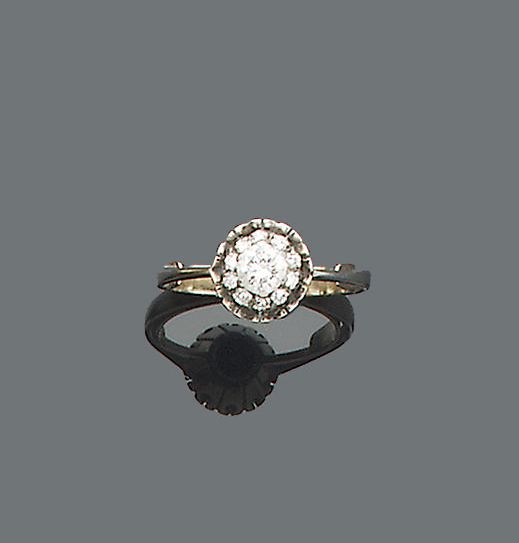 A diamond cluster ring,